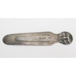 A Victorian silver bookmarker, maker Sampson, Mordan & Co, London, 1892, decorated with a face in