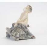 A Royal Copenhagen porcelain model No 858, Faun riding on a turtle, 10cm high.