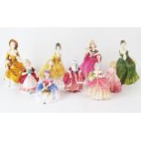 A collection of Royal Doulton figurines includes, Fleur HN2368, Sunday Morning HN2014, Sandra