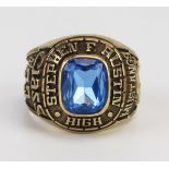 A 10K Gold American College Ring with inset topaz? 'STEPHEN F. AUSTIN HIGHCLASS OF 73 MUSTANGS, size