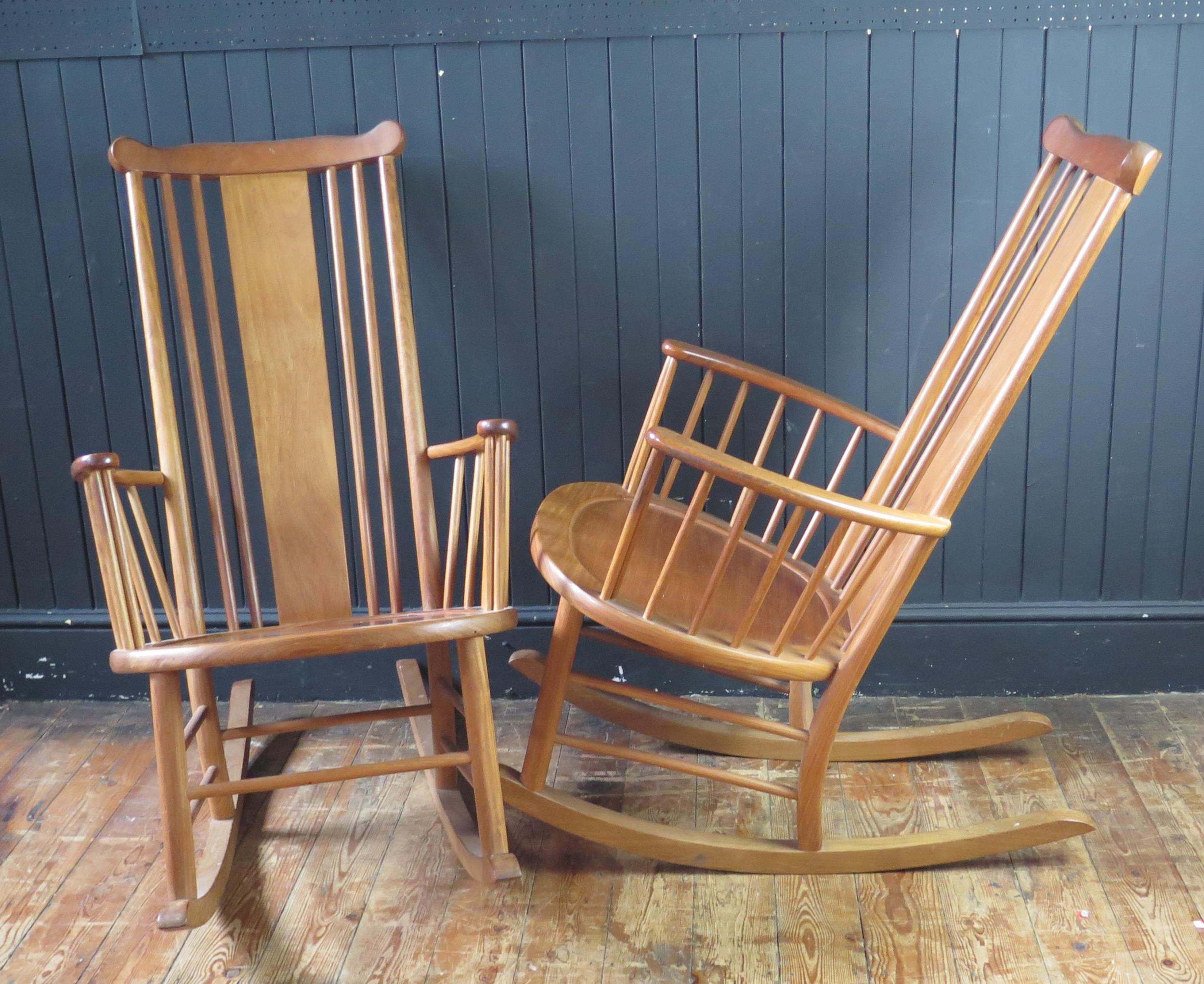 A pair of teak rocking chairs with solid central splat and spindle back with solid seat on rocker - Image 3 of 3