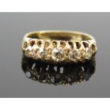 An Antique 18ct Gold and Old Cut Diamond Five Stone Ring, the graduated stones ranging from c. 3.1-