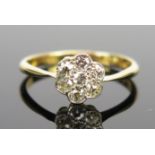 An 18ct Gold and Diamond Daisy Head Ring, 8mm head, size M, 1.9g