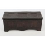 A miniature oak panelled coffer made from a piece of oak from a tree excavated for the foundations