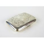 A George V silver cigarette case, maker W H Haseler Ltd, Birmingham 1924, monogrammed, with chased