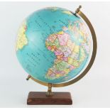 A modern Indian Terrestrial globe, mounted on a polished wood base, overall height 40cm.
