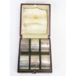 A matched set of six Edward VII silver napkin rings maker Elkington & Co, Birmingham, 1905/06, and