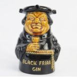 A Dartmouth Pottery advertising jug "Black Friar Gin", 16.5cm high.