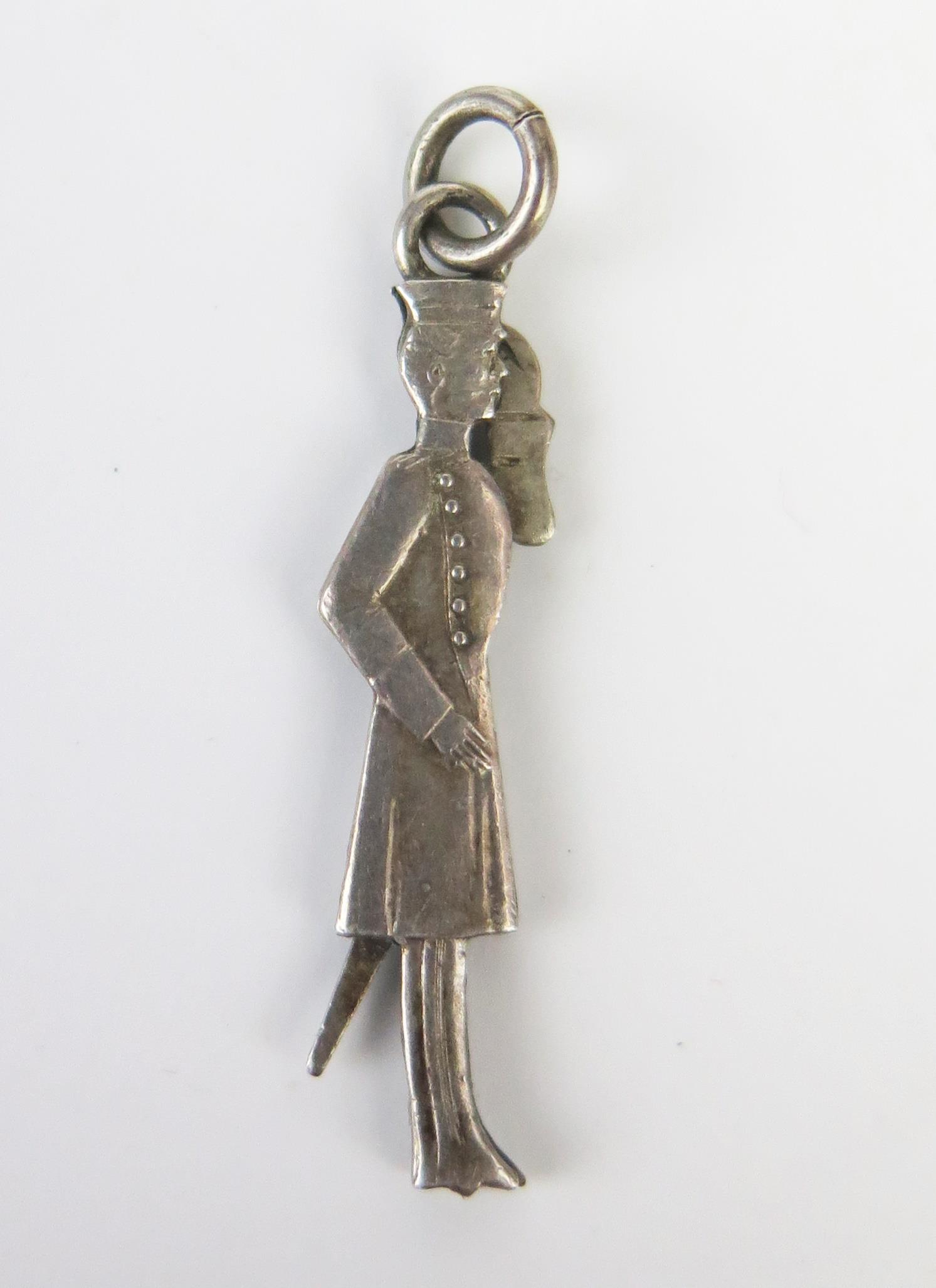 An Antique White Metal Articulated Saluting Officer Pendant, arm moves by adjusting the sword, c. - Image 2 of 3