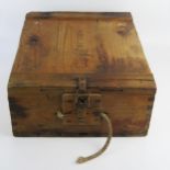 A German stained wood ammunition box, with hinged lid and metal clasp, stencilled marks.45cm long.