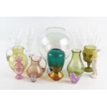 A collection of clear glass and etched wine glasses, assorted coloured glass vases, bowl and jugs