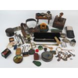 Two assorted hip flasks, various badges, keyrings, Mauchline ware napkin ring, wooden figures etc.