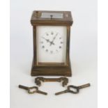 A French brass carriage clock, with 7cm roman dial, the movement with platform escapement, push