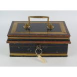 A Milners metal cash box of rectangular outline, the hinged lid enclosing a lidded lift-out tray,