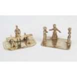 Two miniature silver figure groups, three dancing ladies on a rectangular base, and a cabinet