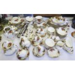 An extensive collection of Royal Albert 'Old Country Roses' pattern tea and dinner wares, vase