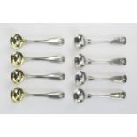 A matched set of eight silver Fiddle, Thread and Shell pattern mustard spoons, various makers and