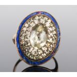 A Georgian Paste and Blue Enamel Ring in an unmarked high carat gold setting, c. 23.5x18mm head,