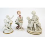 A Capo di Monte porcelain figurine "She loves me-she loves me not" 20cm high together with two