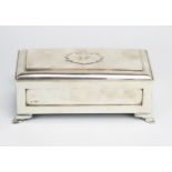 An Edward VII silver casket, maker William Comyns, London, 1902, initialled, of rectangular outline,