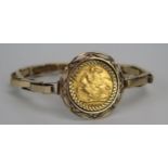 A Victorian 1900 Gold Half Sovereign in a 9ct gold spring loaded bracelet, 11.8g gross (c. 7.7g of