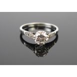 A Platinum and Diamond Solitaire Ring, c. 6.2mm claw set brilliant round cut stone, size M.5, 3.