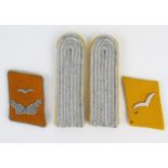 A pair of Third Reich period Luftwaffe, epaulettes, together with collar badges for private and