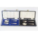 Two silver two-piece christening sets, various makers and dates, each with spoon and fork, both