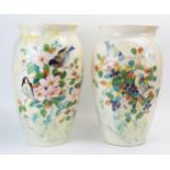 A large pair of Dartmouth pottery vases, hand painted with blue tits and finches amongst