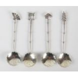 Four Chinese silver spoons, with petal shaped bowls, on knopped stems, 22gms, 0.73ozs