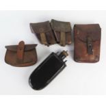 Three assorted leather ammunition pouches, together with a metal water flask.