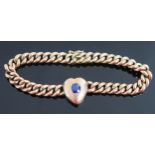 A Victorian Sapphire set in an unmarked gold heart curb link bracelet with glazed panel back, c. 6.