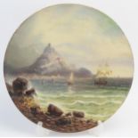 A Torquay terracotta charger painted with a view "St. Michael's Mount, Cornwall", by B Cross,