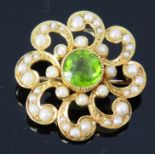 A 15ct Gold, Peridot and untested Pearl Brooch, c. 7mm central stone, 5.2g