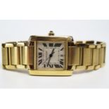 A Gent's CARTIER Tank Française 18K Gold Wristwatch, ref: 1840 with automatic movement and two