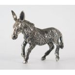 A white metal model of a donkey, 5cm long, 29gms, 0.80ozs