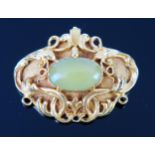 An Antique High Carat Gold and Green Hardstone Mounted Pendant Brooch, c. 16x9.5mm stone, 38.5x29mm,