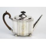 A George III silver teapot, maker George Burrows I, London, 1796, crested, of oval outline with