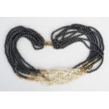An 18.25" Hematite, untested Pearl and 9ct Gold Multi Strand Necklace, clasp hallmarked 147.5g