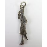 An Antique White Metal Articulated Saluting Officer Pendant, arm moves by adjusting the sword, c.