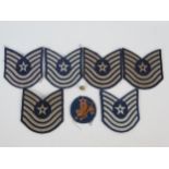 U.S. Airforce Master Sergeant cloth badges x 6 , two metal lapel badges and another cloth badge.