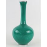 A Japanese cloisonne vase by the Ando Company, of ovoid form with tall slender neck, the green
