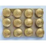 A set of twelve third Reich period gilt metal buttons, with National emblem, on card backing.