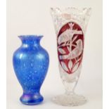 A Heron glass vase of ovoid form with flared rim with blue opalescent bubble decoration, 19cm