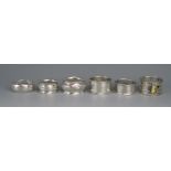 Six assorted silver napkin rings, various makers and dates, total weight of silver 81gms, 2.62ozs