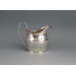 A George III silver barge-shaped cream jug, maker Peter & William Bateman, London, 1808, with banded