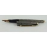 A Sterling silver parker fountain pen, with 14k gold nib,