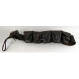 A leather ammunition belt, with five pouches.