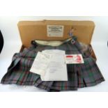 A ladies kilt in the Craig - old colours, waist 33 1/2ins, hips 40ins, length 232 1/2ins, with