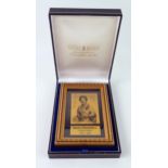 A Brooks & Bentley framed and glazed gold leaf plaque decorated with a portrait of Queen Elizabeth